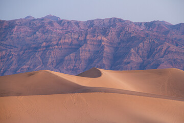 Fototapeta na wymiar Sand dunes in Death Valley near stovepipe wells during sunrise in Death Valley National Park.