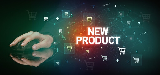 hand holding wireless peripheral with NEW PRODUCT inscription, online shopping concept
