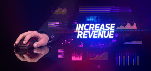 hand holding wireless peripheral with INCREASE REVENUE inscription, cyber business concept
