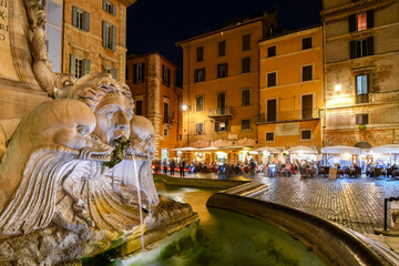 Closeup of the Pantheon Fountain or Fontana del Pantheon in the Piazza della Rotonda at night with...