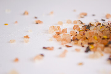 close up himalaya pink salt with red pepper isolated on white background. 