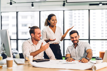 Group of professional business meeting and discussing strategy with new startup project.Creative business people planning and brainstorm with laptop computer in modern office.Teamwork concept