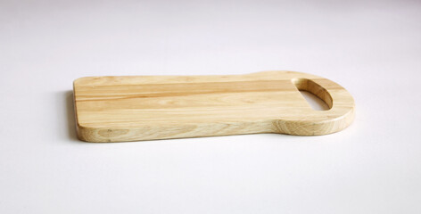Mini wooden chopping board isolated white background