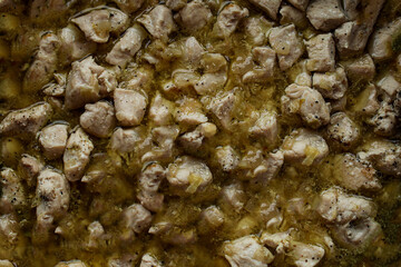 fried stew with spices. Appetizing background, food wallpaper.