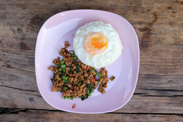 stir fried pork with holy basil and cow pea, fried egg