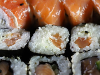 set sushi in black plastic box