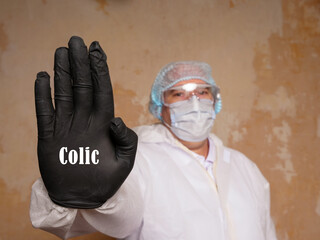 Medical concept about Colic with inscription on the piece of paper.