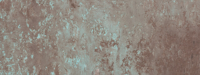 Textured surface for backdrop. A panorama of a wall covered with volumetric plaster with diffusion. Color - Jet Stream hue Green, Dorado hue Brown.
