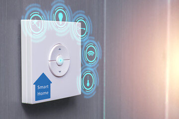 Smart hoome system control panel. The remote control labeled smart hoome is attached to the wall....