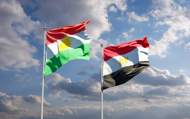 Flags of Kurdistan and Egypt.