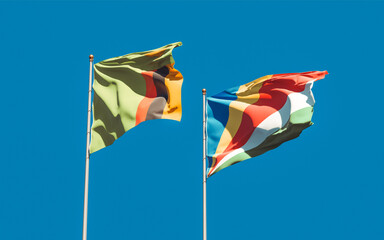 Flags of Zambia and Seychelles.