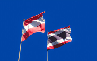 Flags of Thailand and Austria.