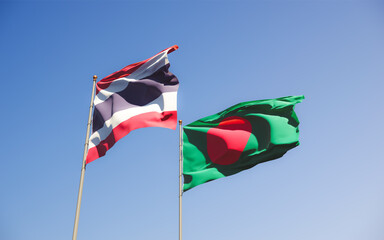 Flags of Thailand and Bangladesh.