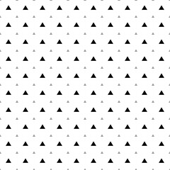 Square seamless background pattern from black triangle symbols are different sizes and opacity. The pattern is evenly filled. Vector illustration on white background