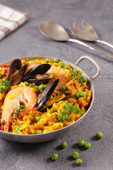 spanish paella with seafood and pea