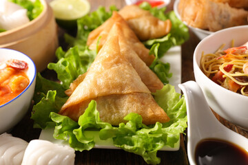 fried samosa with lettuce and soy sauce