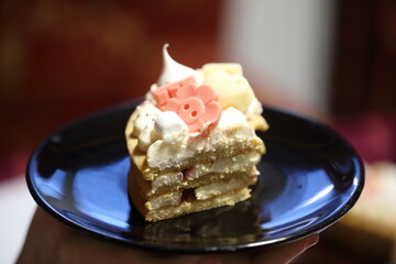 A piece of cake on a blue plate