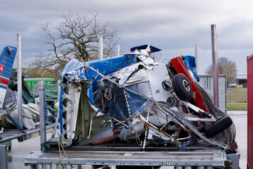 Wrecked airplane parts at the military airport of Payerne, Switzerland.