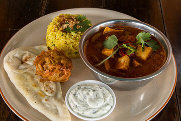 Chicken Tikka Masala with rice and Naan bread