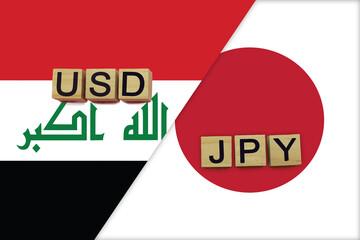 Iraq and Japan currencies codes on national flags background
