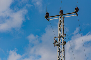 Old electricity pole and blue sky in Turkey.