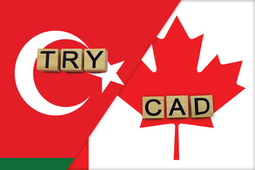 Turkey and Canada currencies codes on national flags background