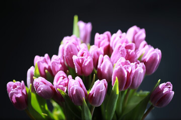 Bouquet of fresh flowers. Holiday gift to your loved one. Background St. Valentine's Day. Rose, tulip, iris flower arrangement.