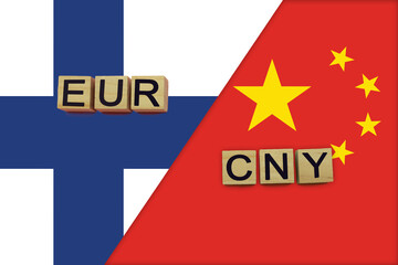 Finland and China currencies codes on national flags background