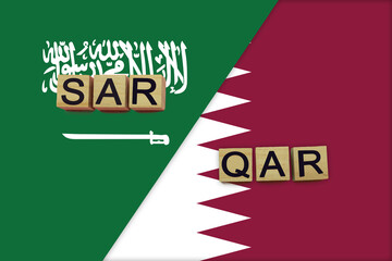Saudi Arabia and Qatar currencies codes on national flags background