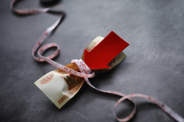 Business concept. The depreciation of the national currency. Bill with the inscription 