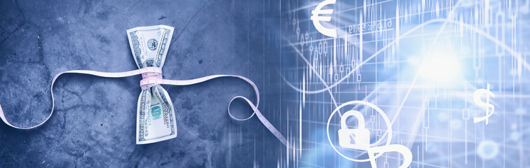 Business concept. The depreciation of the national currency. Hundred dollar bill. Inflation and stagnation. Tighten the hundred dollar bill with a measuring chain.