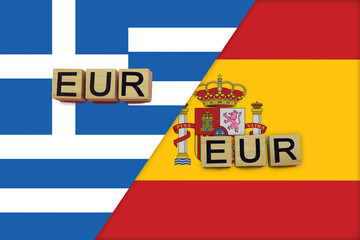 Greece and Spain currencies codes on national flags background