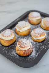 traditional home made swedish semlor pastry on a table
