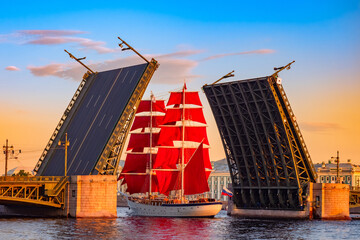 Saint Petersburg. Russia. A ship with scarlet sails passes under the Palace bridge. White nights in...