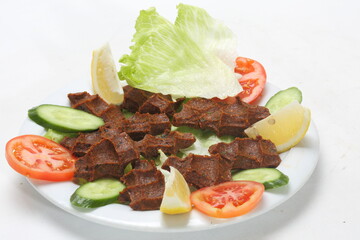 bulgurballs bulgur spices and tomato parsley lettuce