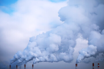 Factory in the city. Cityscape. Environmental problem of environmental pollution and air in large cities