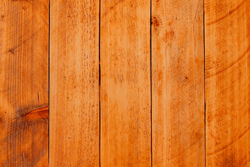 Wooden background, boards of beautiful natural color, freshly cleaned. Flatley building materials wood.