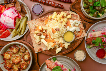 Assortment of georgian food, flat lay. Top view on traditional georgian cuisine close up.