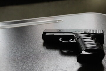 a movie actor's gun lying on the table