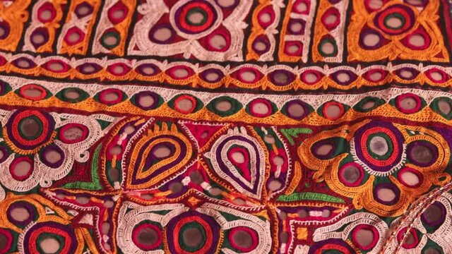 Hd quality footage of embroidery,colorful handmade ahir bharat, kutchhi bharat,Mirrored embroidery work typical of the Ahir tribe in Gujarat, India,