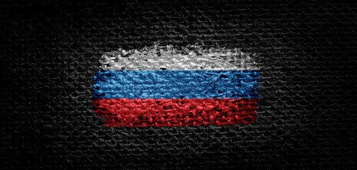 National flag of the Russia on dark fabric