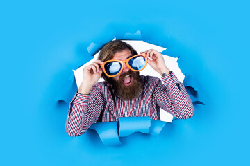 time to celebrate holidays. looking so stylish. going crazy and having fun. mature bearded man wear funny party glasses. brutal male hipster in summer sunglasses