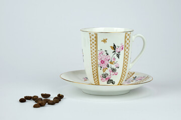 A cup of coffee isolated on a light background