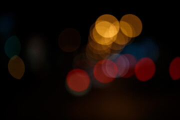 Abstract defocused bokeh lights background. Night city street
