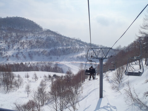 Ski lifts and snowy mountains (Kawaba, Gunma, Japan)