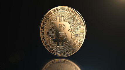 Golden bitcoin coin on black reflective background. Popular digital currency. Cryptocurrency created, distributed, traded, and stored in decentralized ledger system known as a blockchain.