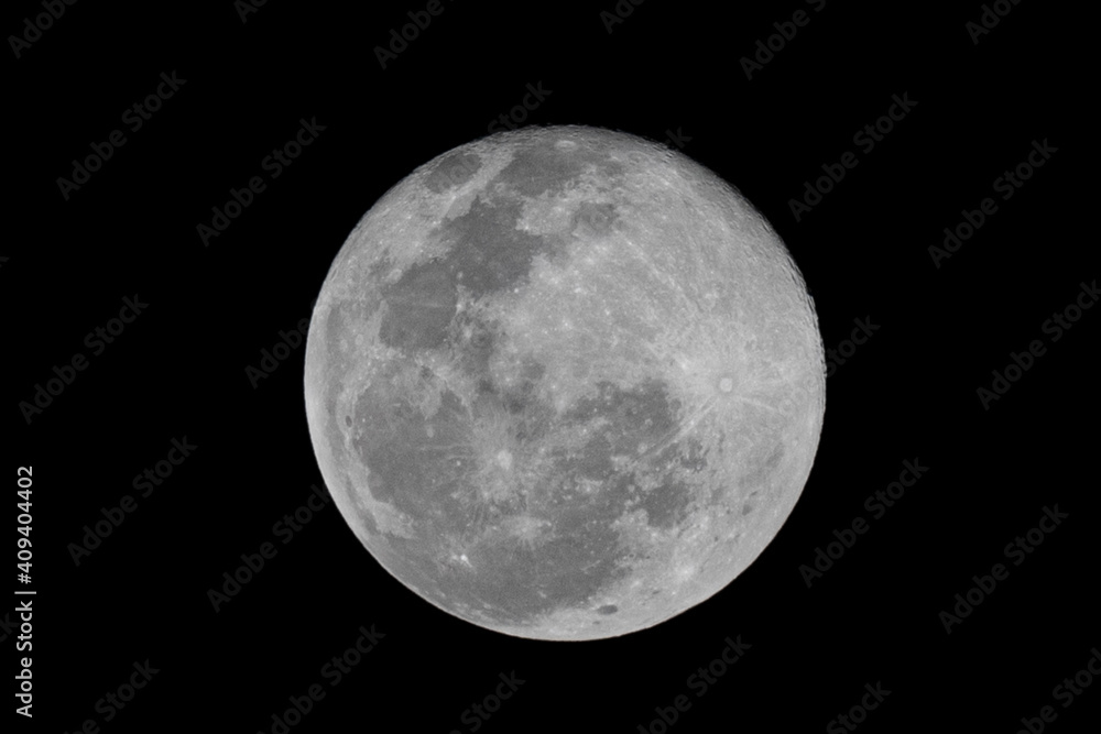Wall mural full moon stack dark night sky. the full moon is lunar phase when it appears fully illuminated from 