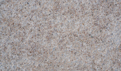 Stone background. blue gravel. Granite texture. The rocky road. Construction material. The texture of the stones. Wallpaper with fine gravel.