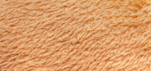Fluffy light fabric soft texture close up.
