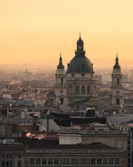 Deurstickers The St Stephen's Basilica and Budapest cityscape at sunrise or sunset in Hungary © Michael Niessen